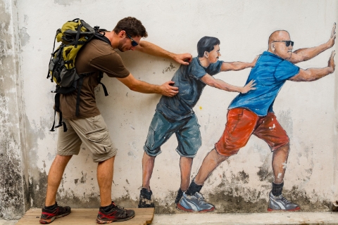 Murale w Georgetown: mężczyźni podpierający ścianę